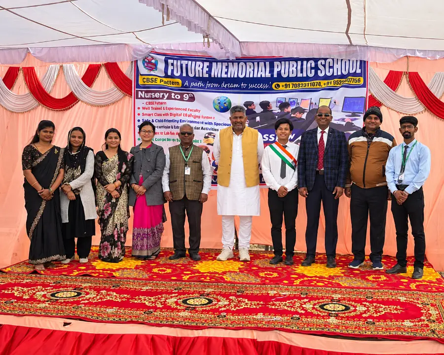 Teachers and staff on stage at a school function